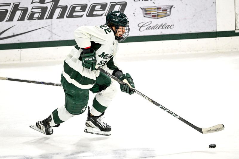 Michigan State's Isaac Howard moves the puck against Minnesota during the first period on Saturday, Jan. 25, 2025, at Munn Arena in East Lansing.