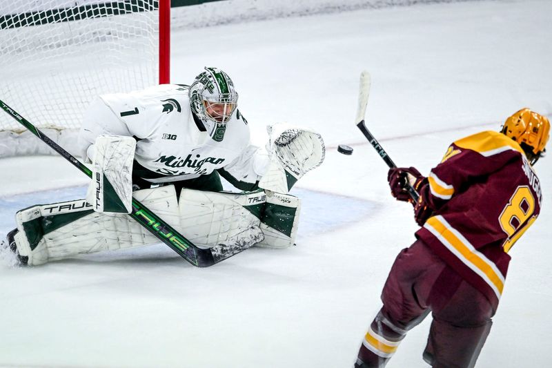 Michigan State's Trey Augustine, left, stops a goal attempt by Minnesota's Jimmy Snuggerud during a shootout on Saturday, Jan. 25, 2025, at Munn Arena in East Lansing.