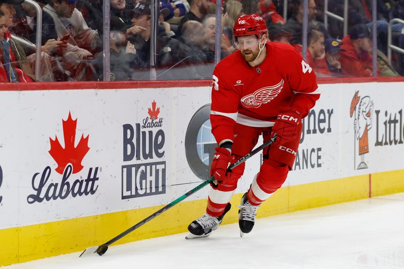 Dec 27, 2024; Detroit, Michigan, USA; Detroit Red Wings defenseman Jeff Petry (46) skates with the puck in the third period against the Toronto Maple Leafs at Little Caesars Arena. Mandatory Credit: Rick Osentoski-Imagn Images