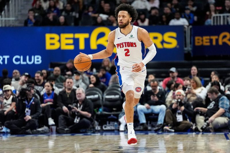 Detroit Pistons guard Cade Cunningham (2) dribbles against Dallas Mavericks during the first half at Little Caesars Arena in Detroit on Friday, Jan. 31, 2025.