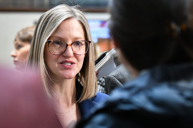 State of Michigan Budget Director Jen Flood speaks with members of the news media, Wednesday, Feb. 5, 2025, after presenting Gov. Gretchen Whitmer's 2026 budget to lawmakers at the state Capitol.