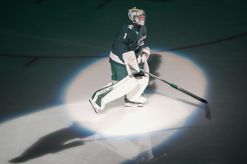Michigan State goaltender Trey Augustine (1) skates during players introduction at Duel in the D between Michigan and Michigan State at Little Caesars Arena in Detroit on Saturday, Feb. 8, 2025.