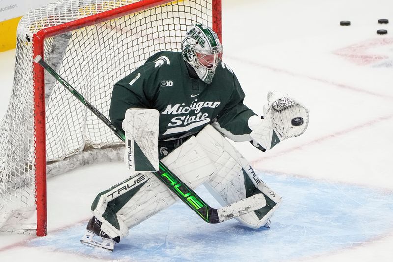 Michigan State goaltender Trey Augustine (1) warms up before Duel in the D between Michigan and Michigan State at Little Caesars Arena in Detroit on Saturday, Feb. 8, 2025.