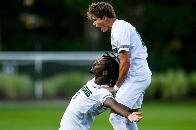 Michigan State's Efosa Emovon, left, celebrates his goal with teammate Richie Ludwig during the first half of the game against Bowling Green on Monday, Aug. 28, 2023, at DeMartin Soccer Complex in East Lansing.