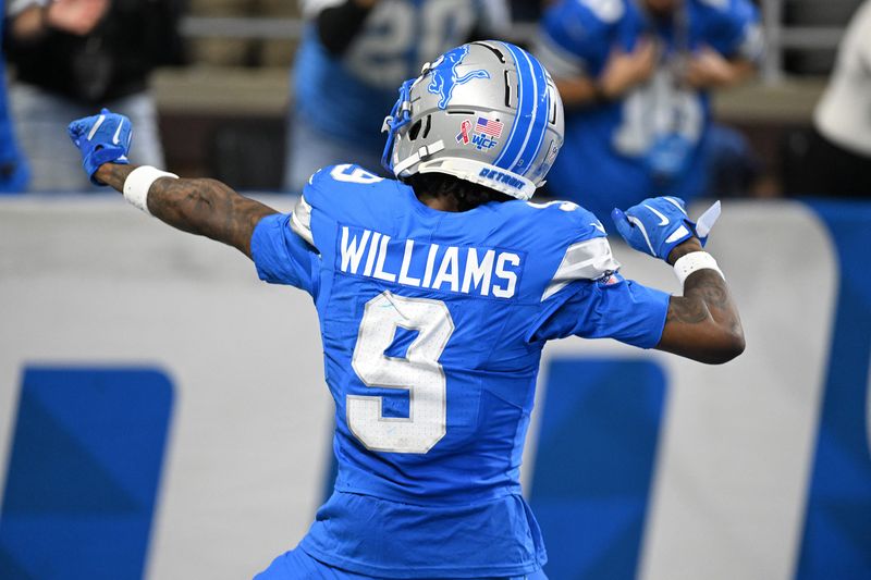 Sep 8, 2024; Detroit, Michigan, USA; Detroit Lions wide receiver Jameson Williams (9) celebrates in front of the fans after catching a touchdown pass against the Los Angeles Rams in the third quarter at Ford Field. Mandatory Credit: Lon Horwedel-Imagn Images