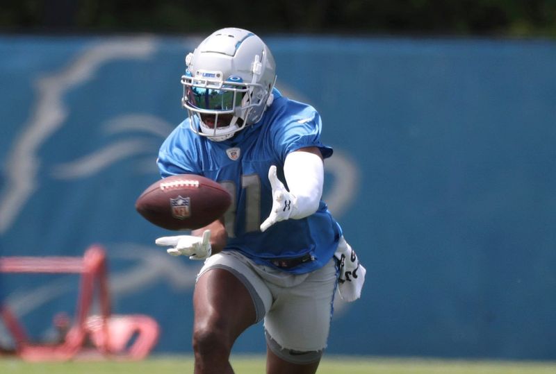 Lions receiver Quintez Cephus goes through passing drills during OTAs on Thursday, June 2, 2022, in Allen Park.

Lions