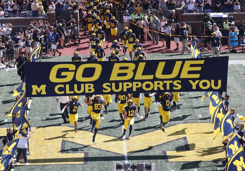 The Michigan Wolverines take the field before action against the Colorado State Rams, Saturday, Sept. 3, 2022 at Michigan Stadium.