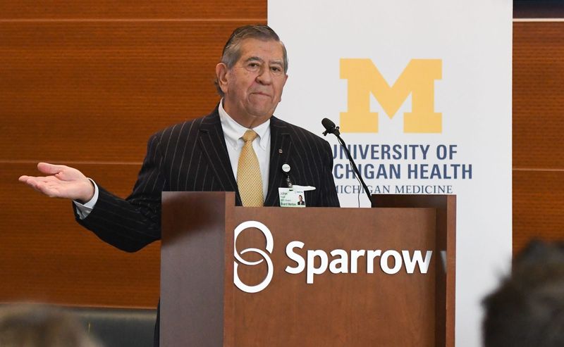 Then-Sparrow Health System Board Chair John Pirich speaks Dec. 9, 2022, during a press conference at Sparrow Hospital where he and other officials talked about Sparrow's acquisition by Michigan Medicine.