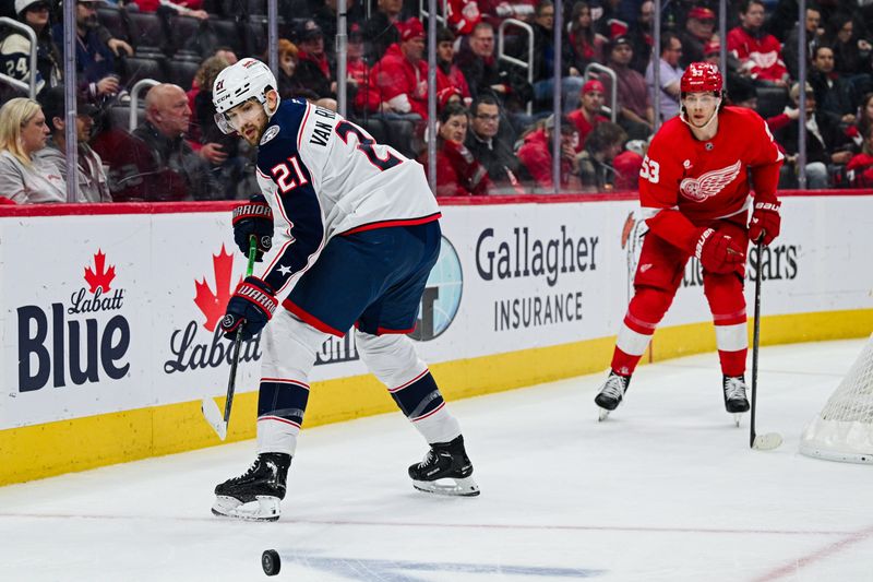 Columbus Blue Jackets left wing James van Riemsdyk (21) clears the puck during the third period against the Detroit Red Wings at Little Caesars Arena in Detroit on Thursday, Feb. 27, 2025.