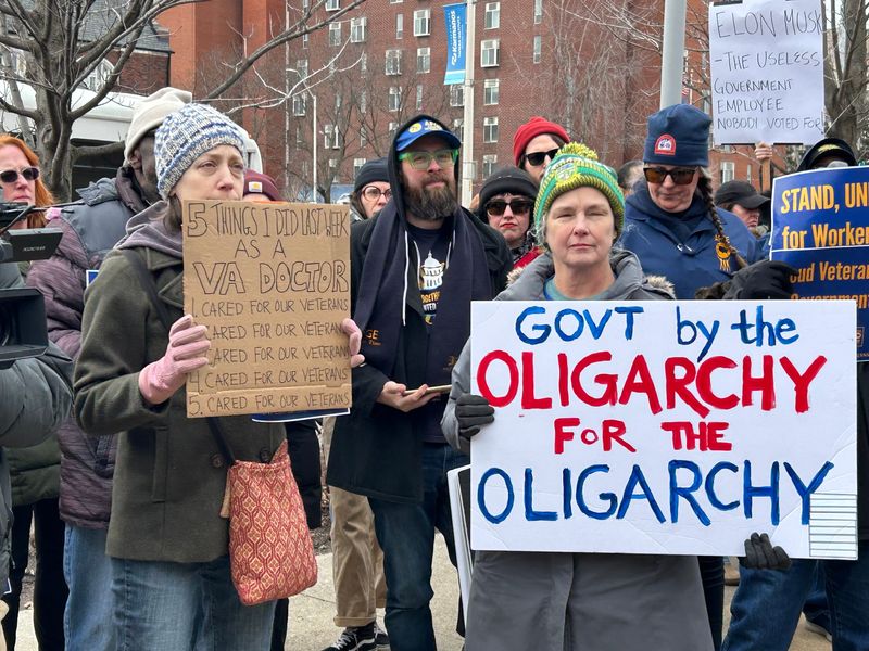 Protesters join American Federal Government Employees' rally outside the John D. Dingell Department of Veterans Affairs Medical Center in Detroit Friday, February 28, 2025.