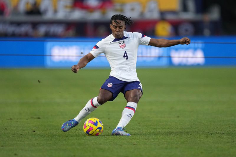USMNT defender DeJuan Jones (4) kicks the ball against Columbia in the first half Jan 28, 2023 at Dignity Health Sports Park. The teams played to a 0-0 tie.