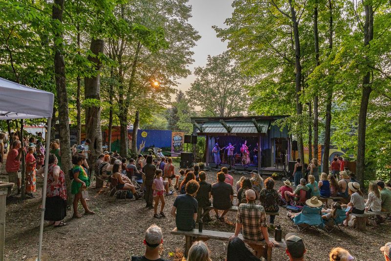 Festivalgoers gather to listen at one of the many music stages during the 2024 Blissfest Music Festival.