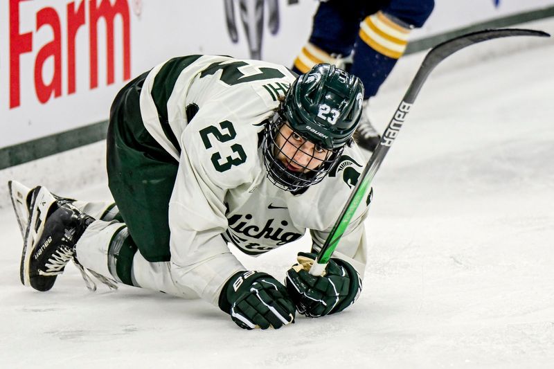 Michigan State's Shane Vansaghi gets up off the ice after falling against Notre Dame during the second period in the Big Ten tournament on Saturday, March 15, 2025, at Muni Arena in East Lansing.