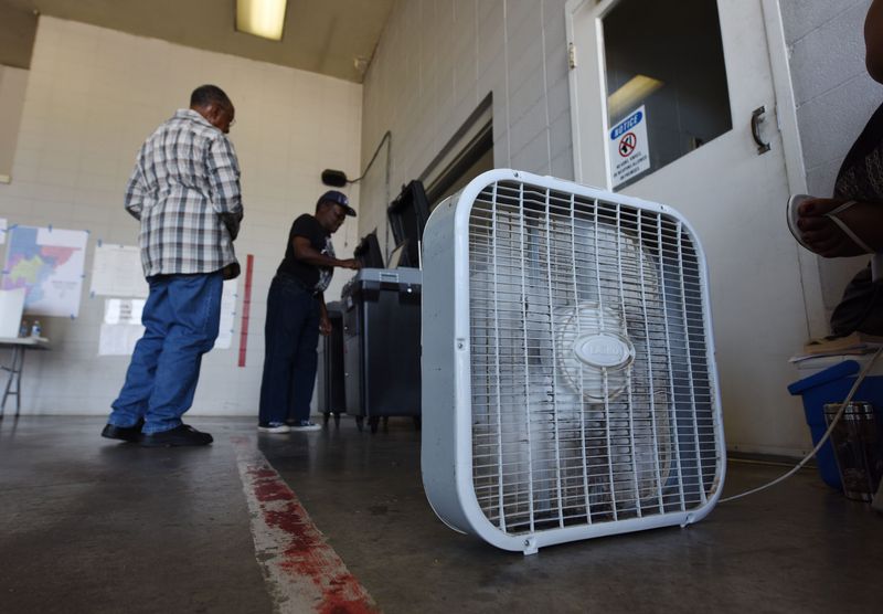 A box fan provides scant relief from the heat at the voting precinct located at Fire Station 26 in Jackson Clarion Ledger file photo.