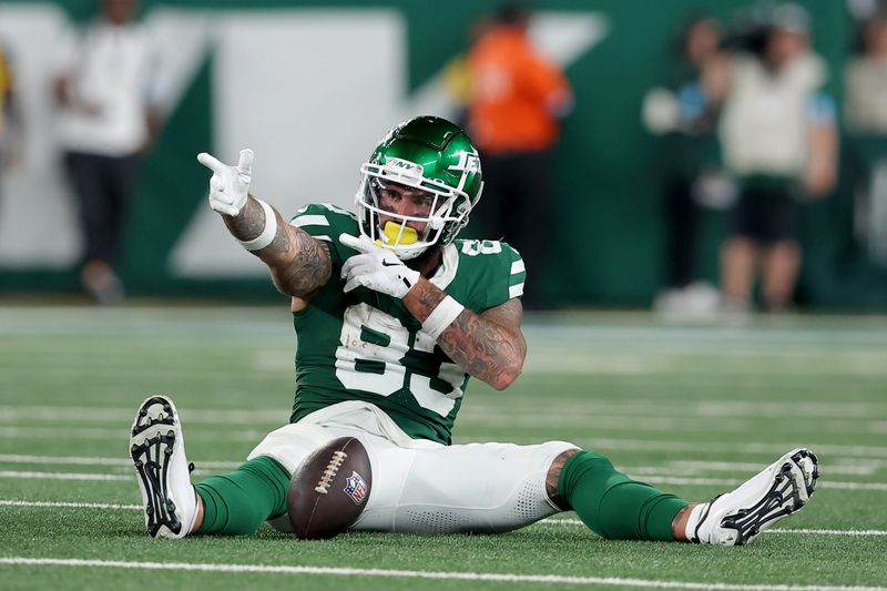 Sep 19, 2024; East Rutherford, New Jersey, USA; New York Jets tight end Tyler Conklin (83) signals first down after a catch against the New England Patriots during the second quarter at MetLife Stadium. Mandatory Credit: Brad Penner-Imagn Images