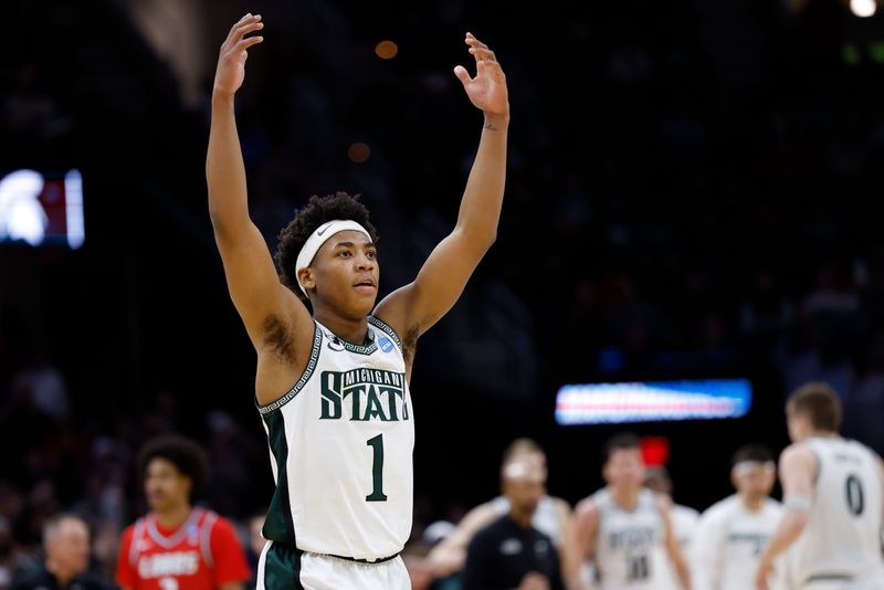 Mar 23, 2025; Cleveland, OH, USA; Michigan State Spartans guard Jeremy Fears Jr. (1) reacts in the second half against the New Mexico Lobos during the NCAA Tournament Second Round at Rocket Arena. Mandatory Credit: Rick Osentoski-Imagn Images