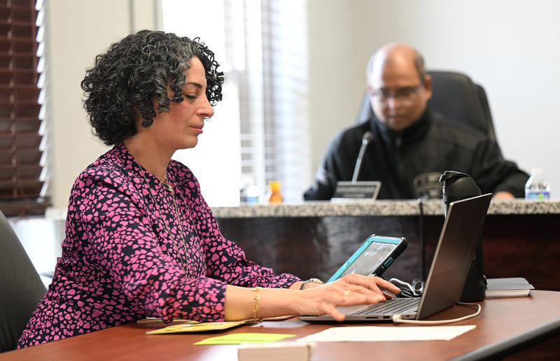 Hamtramck City Clerk Rana Faraj works during the City Council meeting at Hamtramck City Hall in Hamtramck on March 25, 2025. Faraj was fired sometime in March 2026 for unspecified misconduct, Mayor Adam Alharbi and City Council member Nayeem Choudhury.