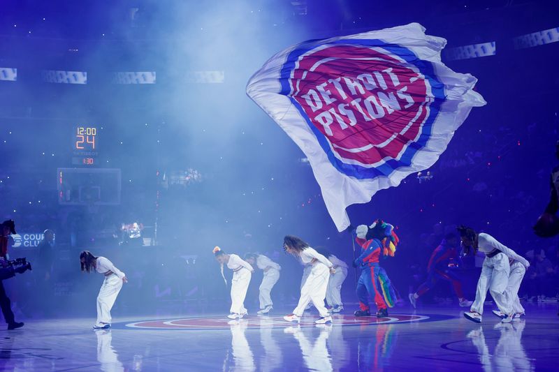Detroit Pistons dancers perform with Hooper before the game against the Cleveland Cavaliers at Little Caesars Arena in Detroit on Friday, March 28, 2025.