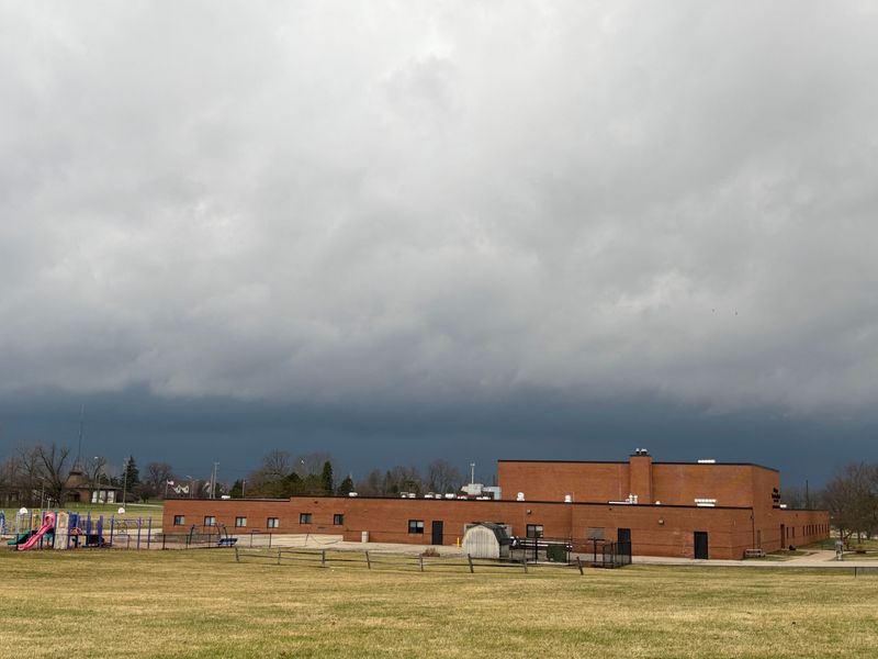 A bank of thick clouds and severe weather approaches Howell on Sunday evening.