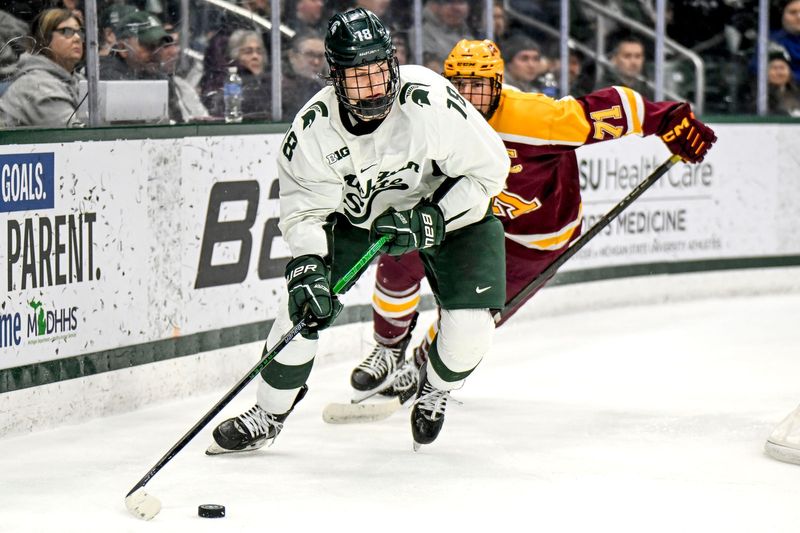 Michigan State's Joey Larson moves the puck against Minnesota during the second period on Saturday, Jan. 25, 2025, at Munn Arena in East Lansing.