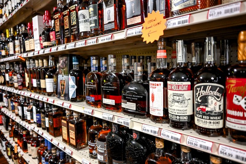 Some of the bourbon and whiskey selection for sale at Mega-Bev beer, liquor and wine superstore at 3630 S. Cedar St. in Lansing on Wednesday, April 2, 2025.