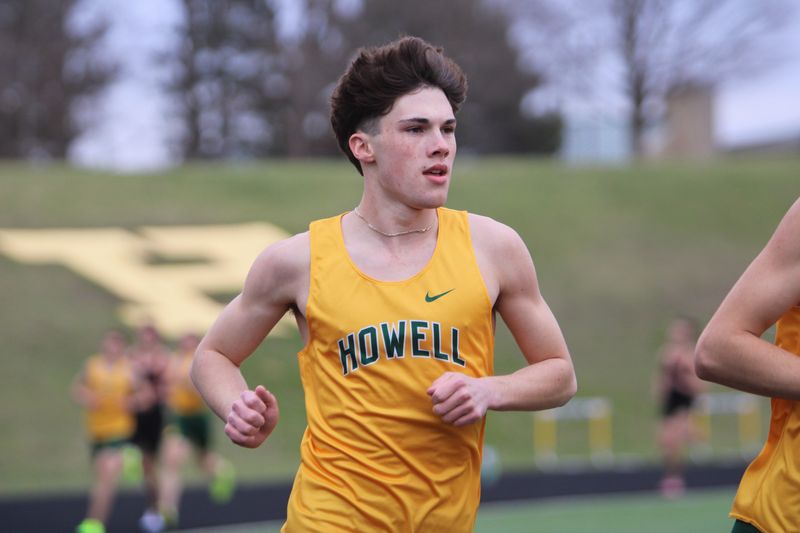 Howell's Jack MacGregor won the 1,600 and 3,200 during a track and field meet against Brighton Thursday, April 3, 2025.
