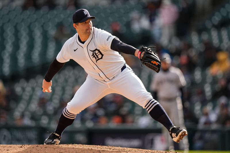 Detroit Tigers pitcher Tommy Kahnle (43) throws against New York Yankees during the ninth inning at Comerica Park in Detroit on Monday, April 7, 2025.