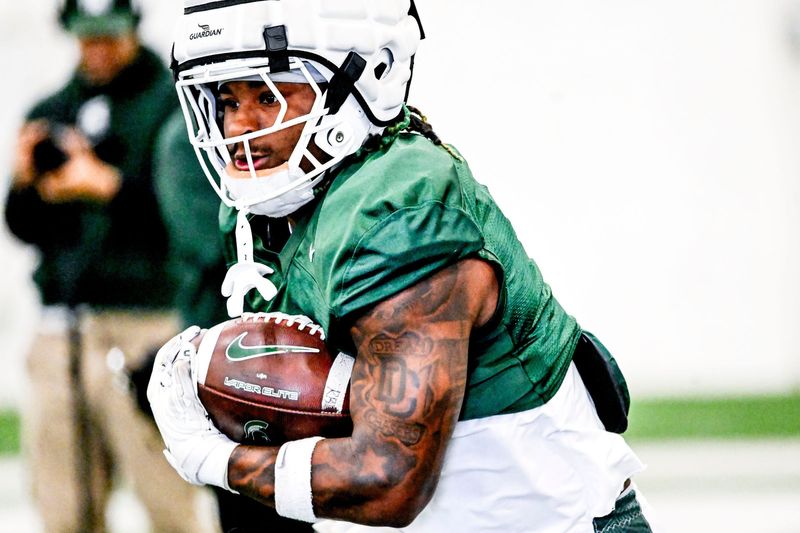 Michigan State running back Makhi Frazier runs a drill during football practice on Tuesday, April 8, 2025, in East Lansing.