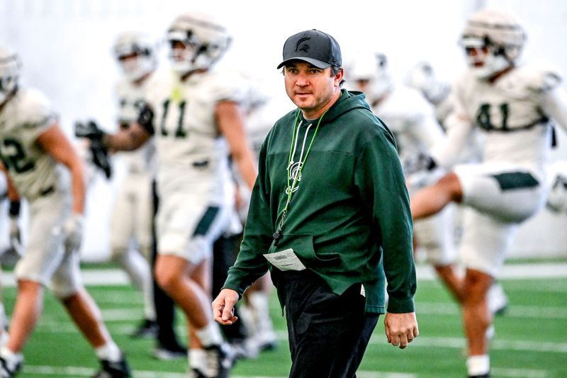 Michigan State football head coach Jonathan Smith looks on during practice on Tuesday, April 8, 2025, in East Lansing.
