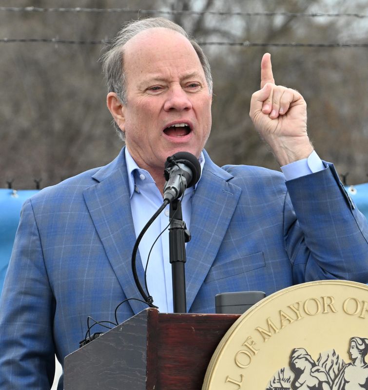 Detroit Mayor Mike Duggan talks during the press conference for the opening of MyFlight, an helicopter tour company, breaks ground at the Coleman A. Young International Airport in Detroit, Michigan on April 9, 2025.