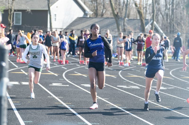 Lakeview runners compete in the girls' 100 meter dash during the Gull Lake Track and Field Invitational at Gull Lake High School on Friday, Apr. 11, 2025.