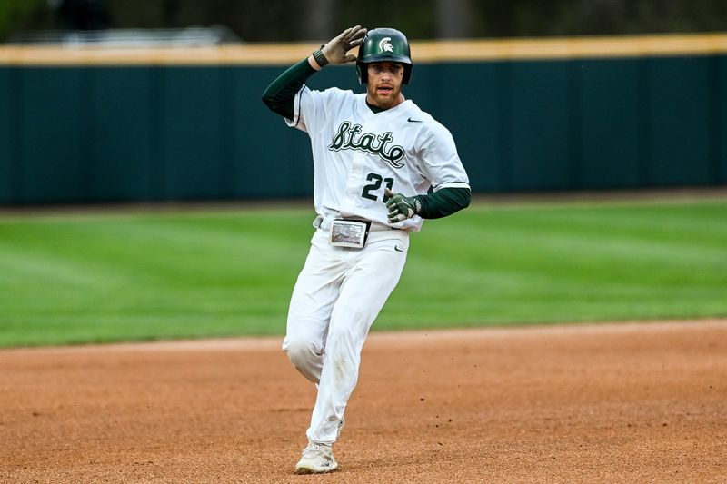 Michigan State's Jack Frank gets to third base against Purdue Fort Wayne during the fourth inning on Wednesday, April 19, 2023, at the McLane Baseball Stadium in East Lansing Mall.

230419 Msu Purdue Fw Baseball 104a