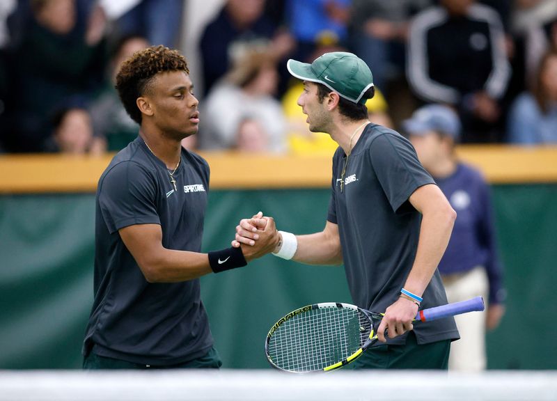 Michigan State's Ozan Baris, right, and Matthew Forbes, shown in this file photo, won their doubles match together and also both won their singles matches in the Spartans' victory over Ohio State on Saturday, April 25, to win the Big Ten tennis tournament.