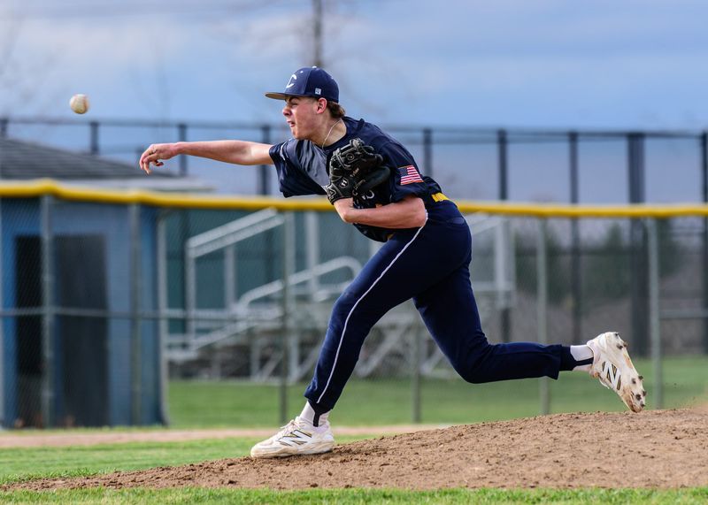 Walled Lake Central's Tyler Malczewski pitches during a Lakes Valley Conference baseball game on Monday, April 21, 2025.