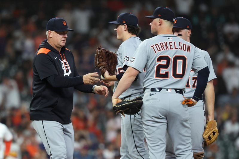 Detroit Tigers manager A.J. Hinch takes the ball from starting pitcher Reese Olson during a pitching change in the sixth inning against the Houston Astros at Daikin Park on April 29, 2025 in Houston.