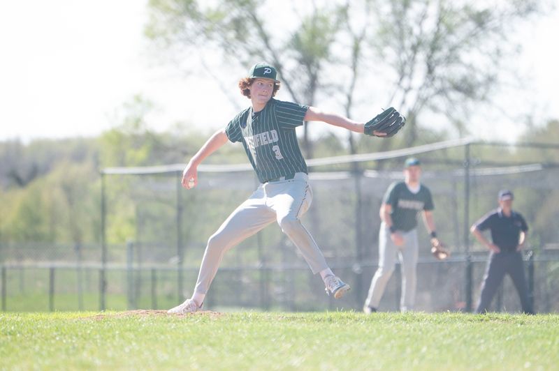 Pennfield's Calvin Paesens pitches during a game against Marshall at Pennfield High School on Tuesday, Apr. 29, 2025.