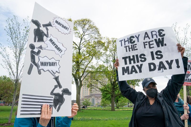 Protesters gather at Roosevelt Park in Detroit on Thursday, May 1, 2025 for the nationwide May Day protests against the Trump administration policies.