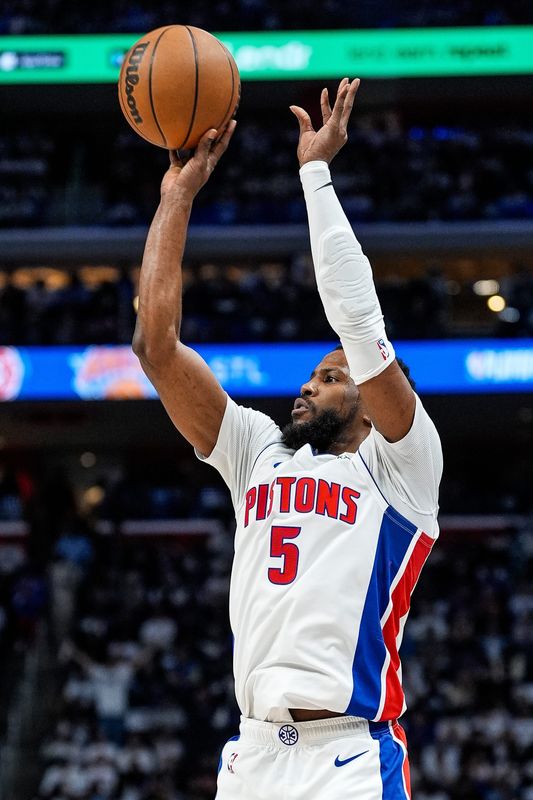 Detroit Pistons guard Malik Beasley (5) makes a jump shot against New York Knicks during the first half of Game 6 of Eastern Conference playoff first round at Little Caesars Arena in Detroit on Thursday, May 1, 2025.