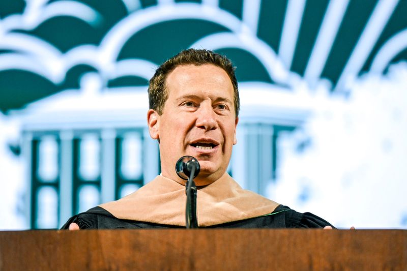 Mat Ishbia, former MSU basketball players, CEO of United Wholesale Mortgage and owner of the Phoenix Suns, addresses graduates during Michigan State University's spring convocation ceremony on Friday, May 2, 2025, at the Breslin Center in East Lansing.