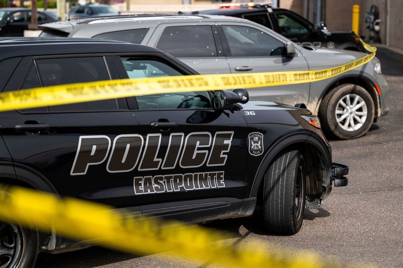 Eastpointe police investigate the scene of a shooting in the parking lot of a Foot Locker store on East 8 Mile Road in Eastpointe on Saturday, May 3, 2025.