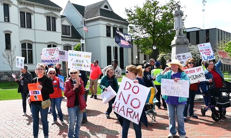 Demonstrators gathered in May at Four Corners Park concerned about numerous Trump administration actions. They plan to return Saturday, July 12 at 10 a.m.