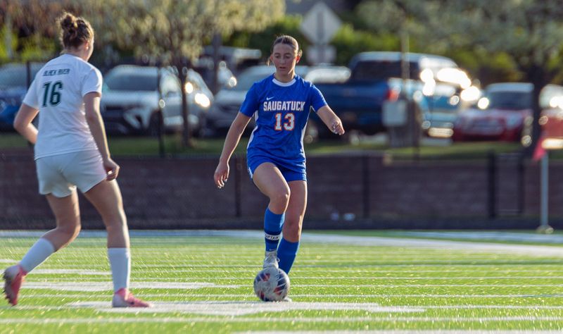 Saugatuck's Neave Rewa moves the ball upfield. The Trailblazers won the Division 4 district championship on Saturday, May 30.