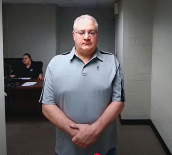 David Coker Jr., a former legislative aide, appears for his arraignment on criminal enterprise and embezzlement charges in 54A District Court on Wednesday, May 14, 2025.