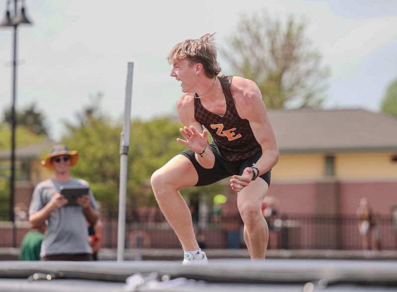 Zeeland East's Bennett Bing reacts after a high jump attempt during the Division 1 regionals.