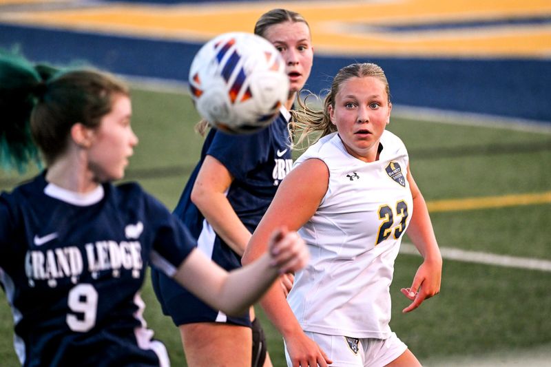 DeWitt's Madison McCarthy goes after the ball against Grand Ledge during the second half on Thursday, May 15, 2025, in the CAAC Gold Cup final at Grand Ledge High School.