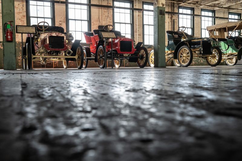 Vehicles are seen on display on a floor of the Ford Piquette Avenue Plant in Detroit on Oct. 28, 2020. Detroit History Tours will be holding the Ghosts of the Factory Tour and Paranormal Investigation at the birthplace of the Model T in the historic plant-turned-museum on Halloween night.