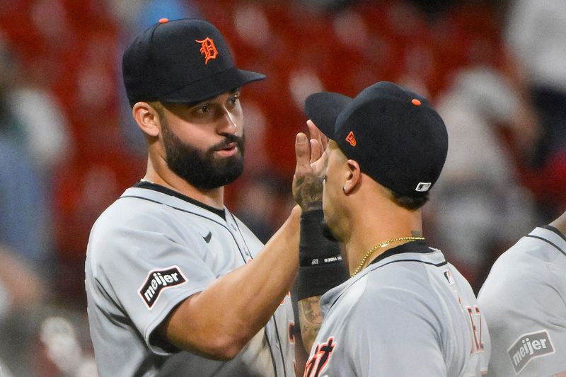 Detroit Tigers' Riley Greene celebrates with center fielder Javier Baez after the Tigers defeated the St. Louis Cardinals at Busch Stadium in St. Louis on Tuesday, May 20, 2025.