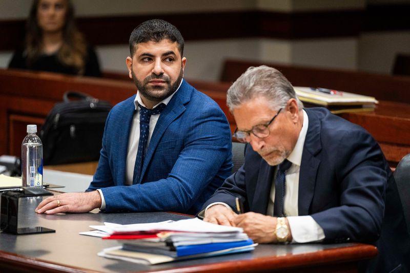 Noor Kestou, left, is seated along with his three attorneys during a preliminary examination on charges of involuntary manslaughter brought against him in relation to the March 2024 explosion of the vape supply store Kestou owns on Thursday, May 22, 2025 in the 41B District Court in Clinton Township.