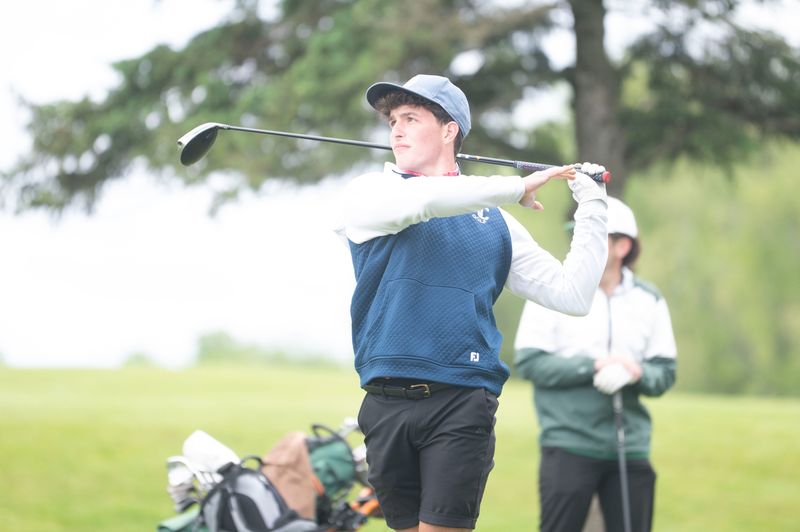 Harper Creek's Joey Mario follows through during the All-City tournament at Cedar Creek Golf Course on Thursday, May 22, 2025.