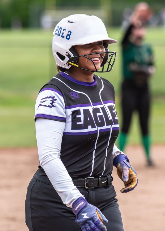 Plymouth Christian Academy's Mariah Wright smiles after hitting a home run during a Michigan Independent Athletic Conference softball game on Thursday, May 22, 2025.